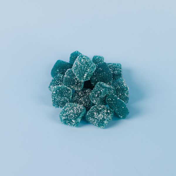 Sugar cubes with blue coating and white sugar crystals, confectionery, blue candies, sugar textures, sweet treats, sugar art, confectionery industry, gourmet candies, food photography, Structure Formulations products.