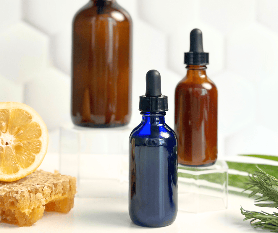 Amber glass dropper bottles for skincare formulations and essential oils, natural health products, and organic cosmetic ingredients, showcasing eco-friendly packaging solutions.